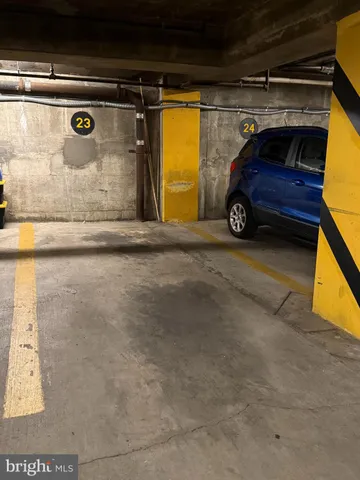 a view of a swimming pool with lounge chair