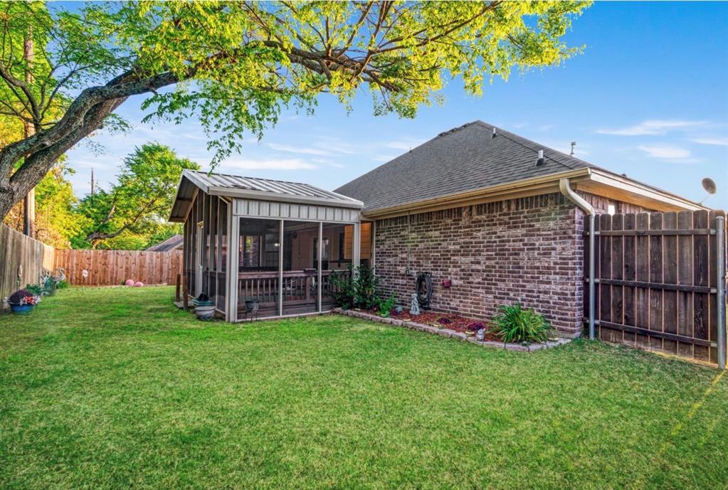 90 44th Street Southwest Paris, TX 75460 - Photo 17 of 17 a view of a house with a yard and plants