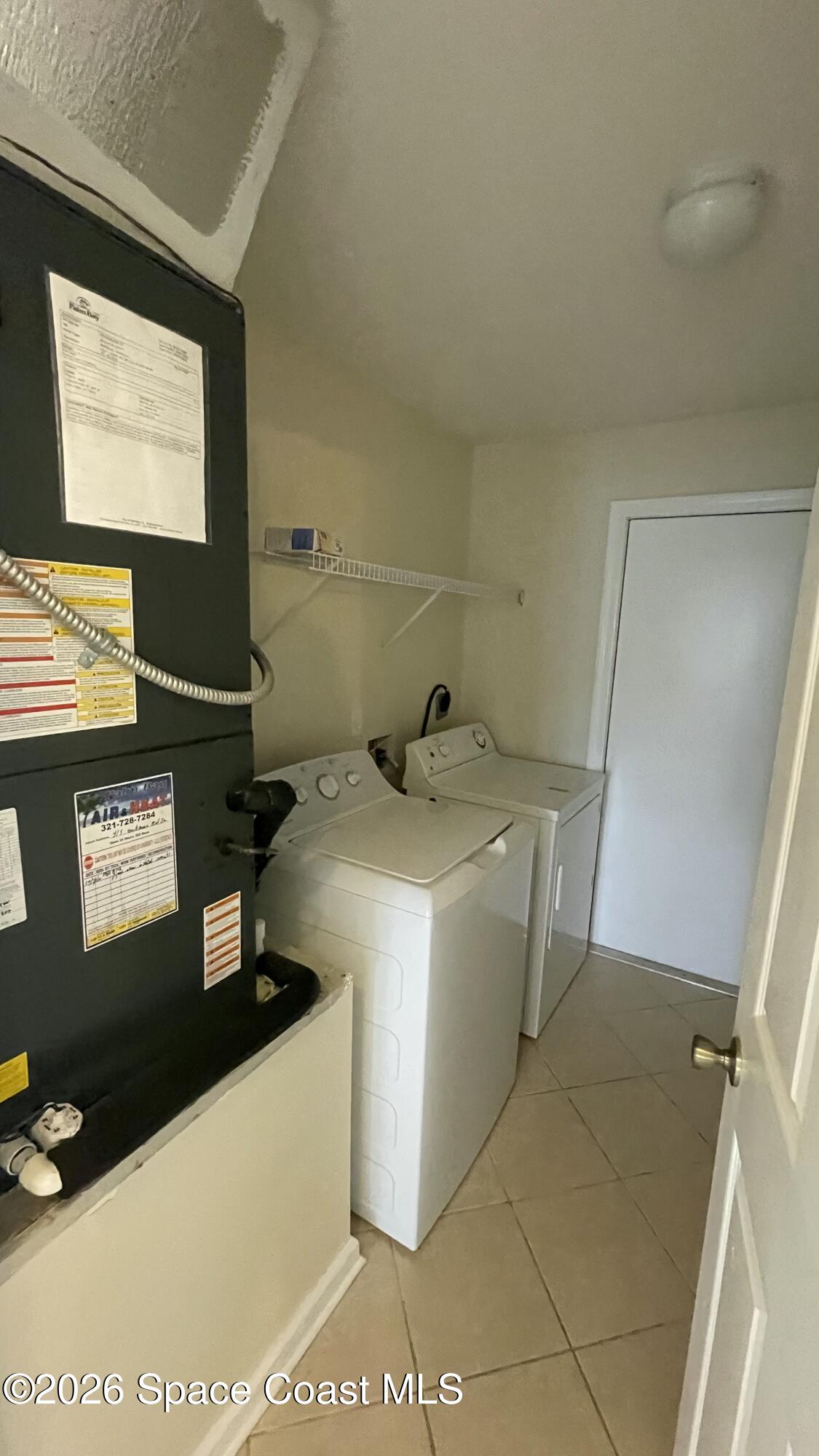 415 Oakmon Road Southwest Palm Bay, FL 32908 - Photo 51 of 61 Indoor laundry