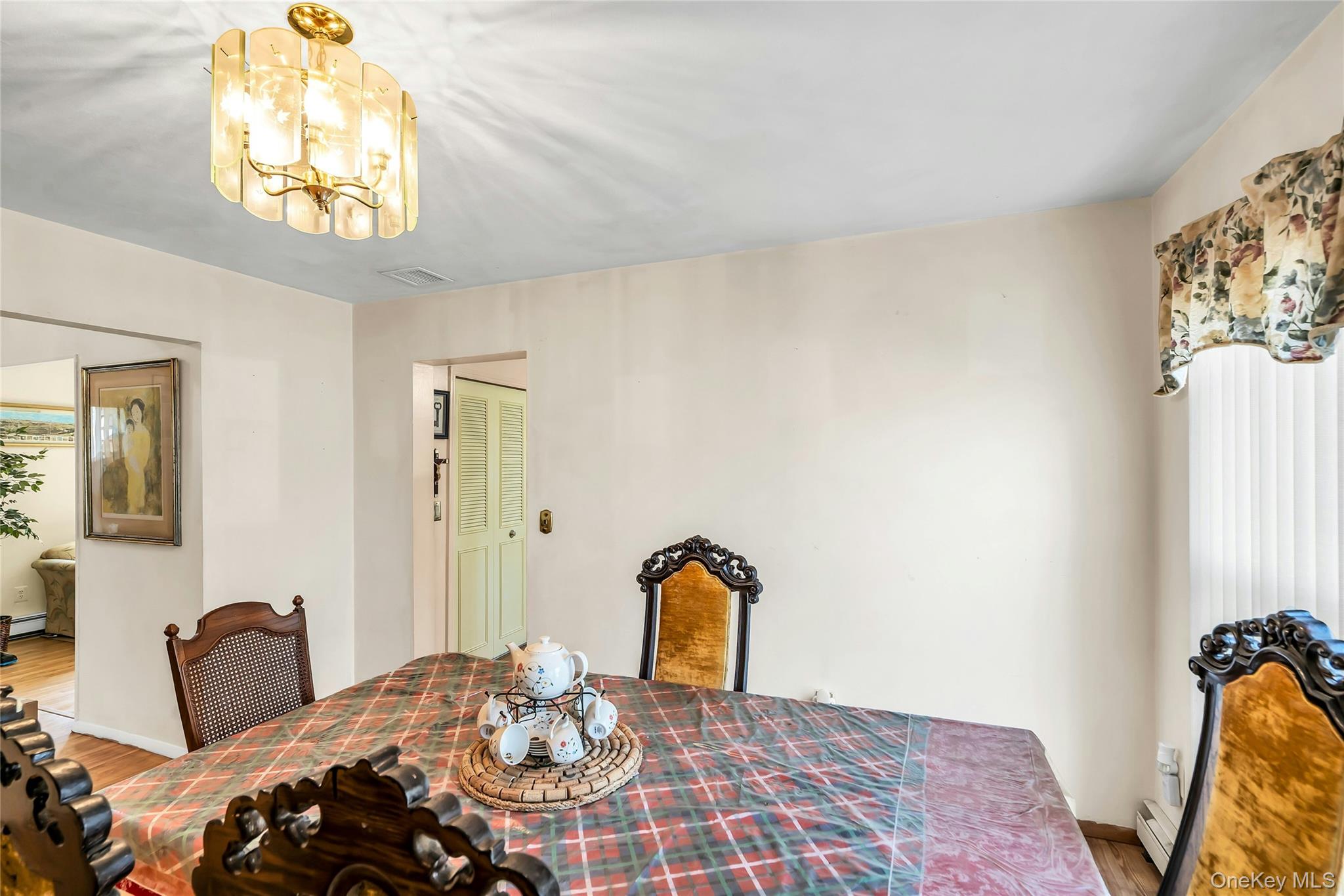 7 Hastings Drive Ridge, NY 11961 - Photo 13 of 33 a bedroom with bed and a window