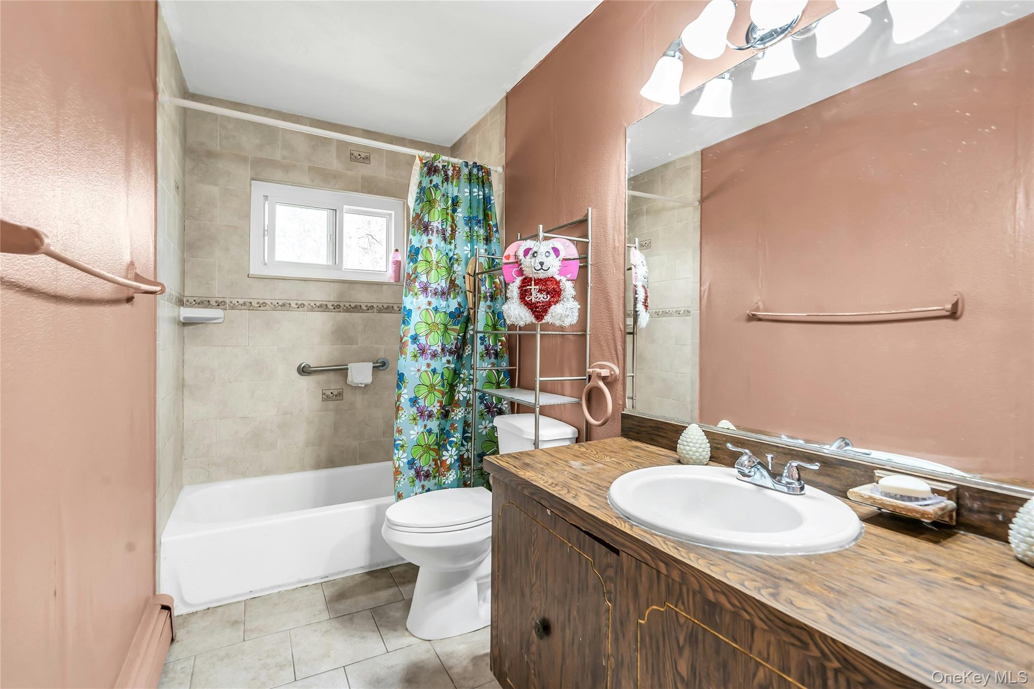 7 Hastings Drive Ridge, NY 11961 - Photo 22 of 33 a bathroom with a granite countertop sink a toilet and shower