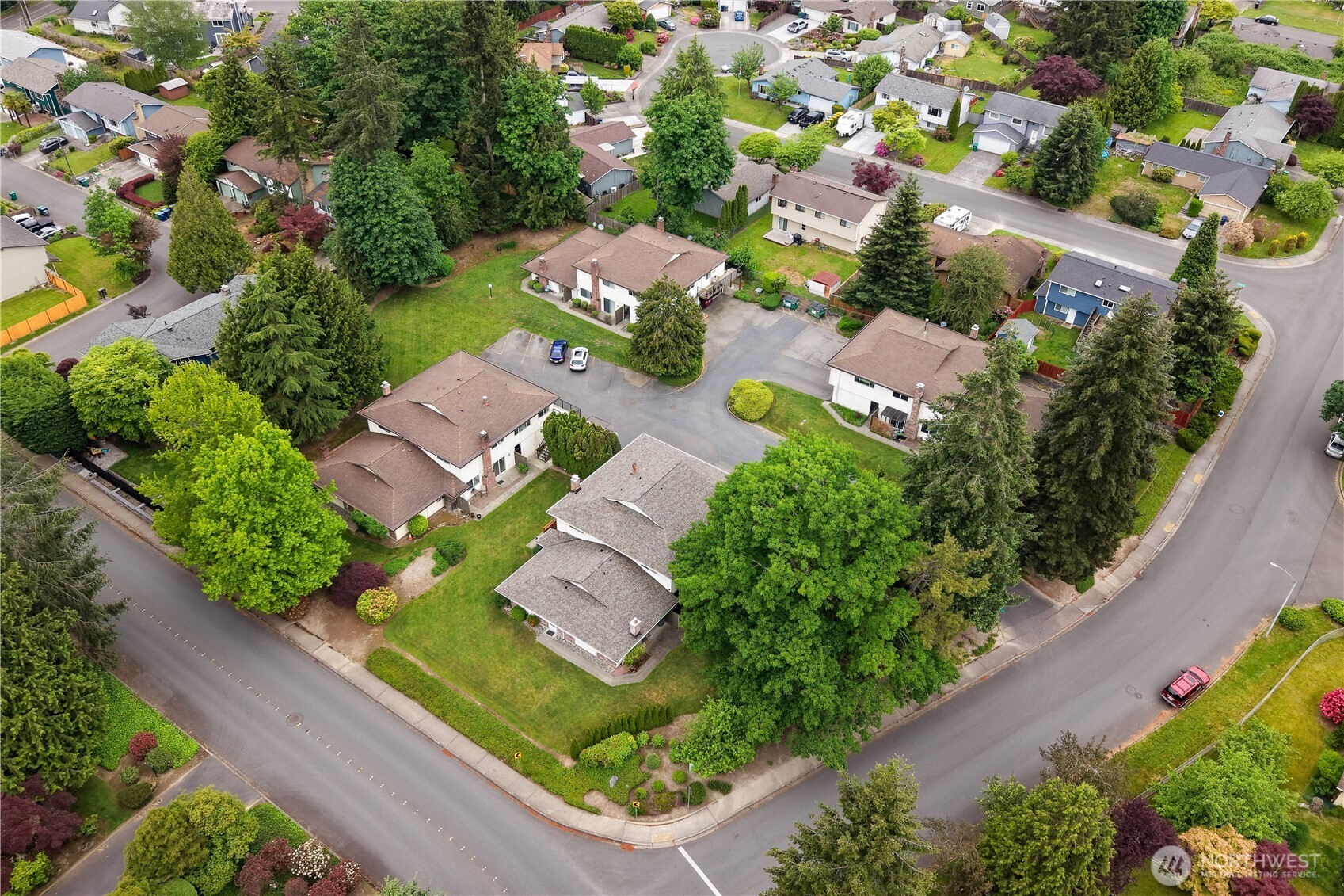 412 213th Place Southwest, Unit 21D Bothell, WA 98021 - Photo 25 of 28 an aerial view of a house with a garden