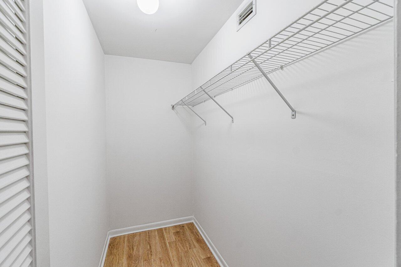 641 Normandy Lane, Unit N Delray Beach, FL 33484 - Photo 16 of 26 a view of small space with racks on the wall