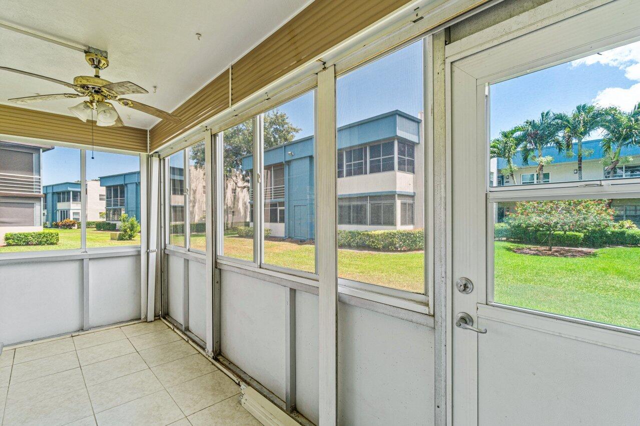 641 Normandy Lane, Unit N Delray Beach, FL 33484 - Photo 18 of 26 a view of an entryway with a tub