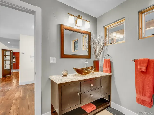 a view of room with window and wooden floor