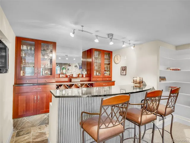 a view of a kitchen and dining area with furniture
