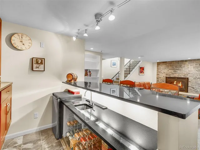 a kitchen with stainless steel appliances a sink and a stove