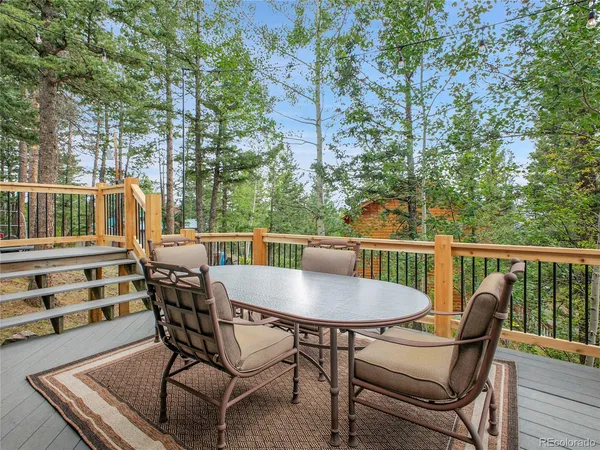 a view of backyard with green space