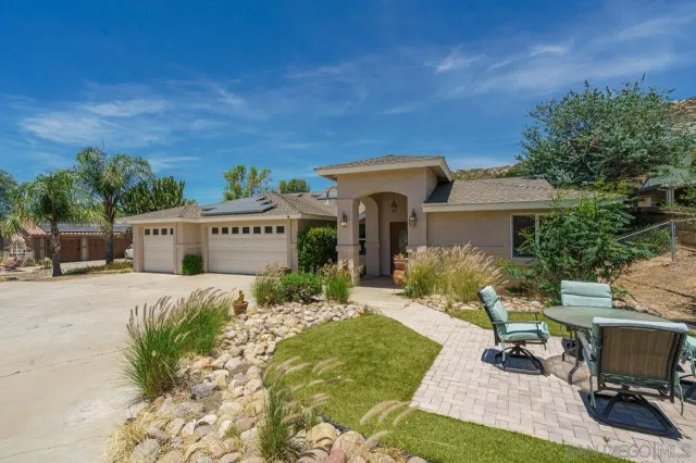 a view of a house with a patio