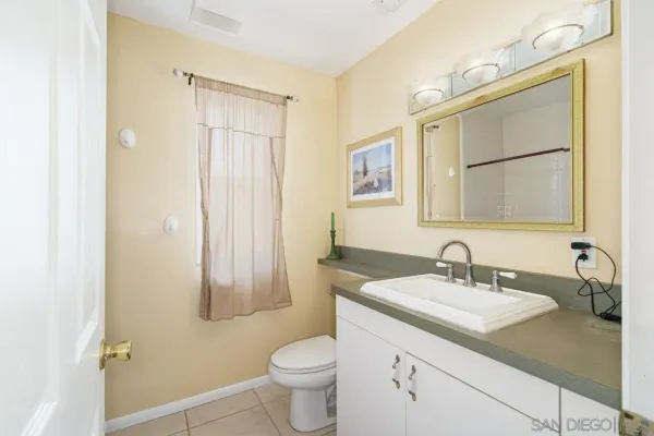 a bathroom with a bathtub and a sink