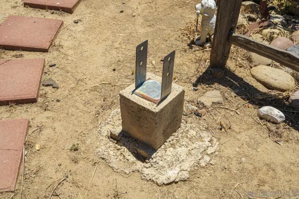 a view of a bench in front of a building