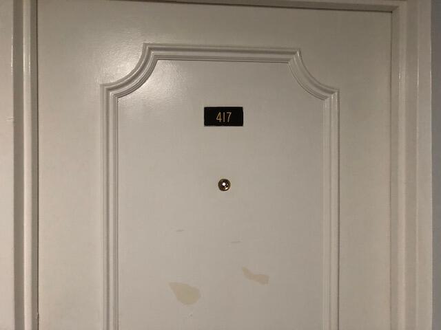 9273 Southwest 8th Street, Unit 417 Boca Raton, FL 33428 - Photo 7 of 25 a view of a hallway