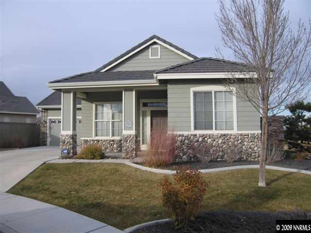 1681 Dutch Ravine Court Reno, NV 89521 - Photo 1 of 9 a front view of a house with garden
