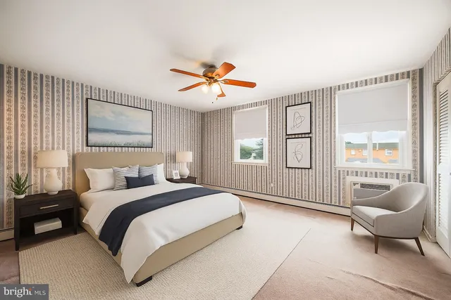 a white toilet sitting next to a bathroom sink