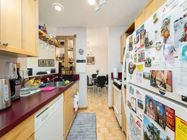 a kitchen with stainless steel appliances granite countertop a stove and a sink