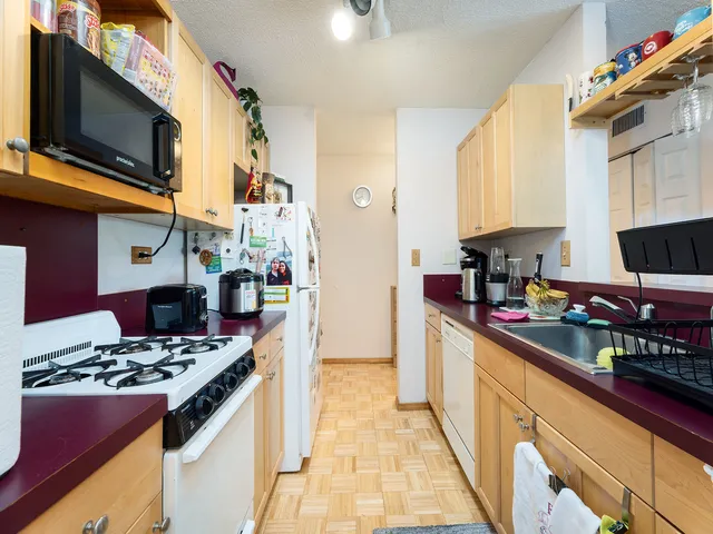 a view of a bathroom from a hallway