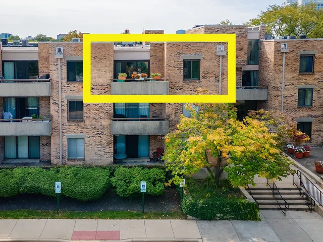 a swimming pool with outdoor seating and yard