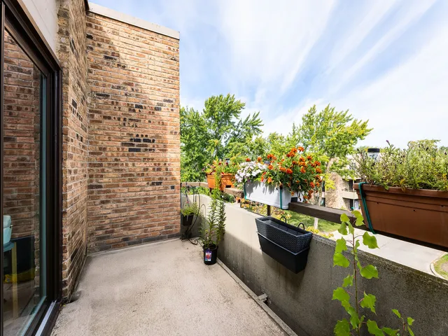a backyard of a house with outdoor seating