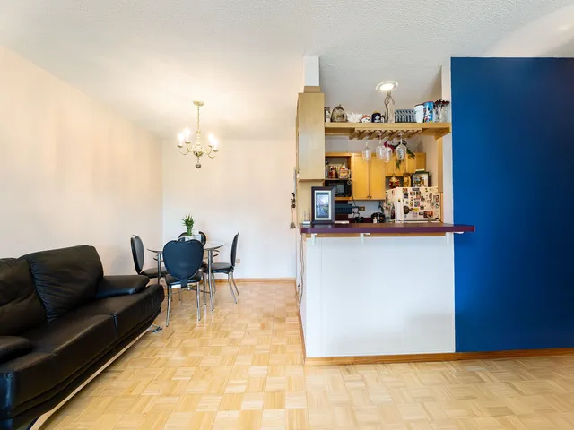 a view of a livingroom with furniture and a couch