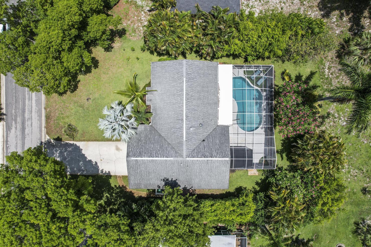 149 Big Springs Drive Naples, FL 34113 - Photo 32 of 35 an aerial view of a house