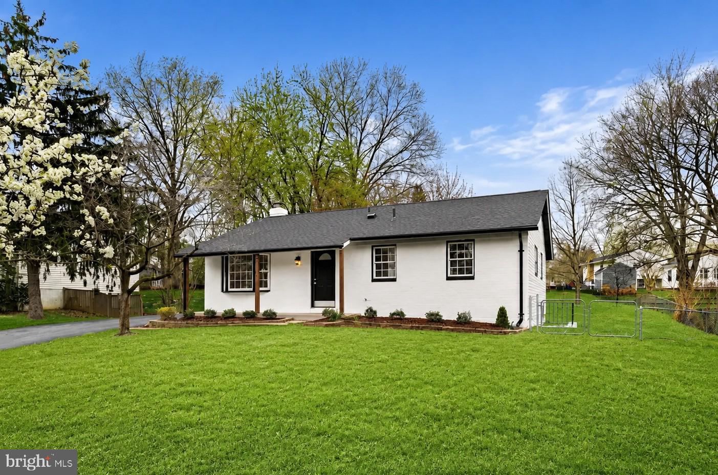 24320 Log House Road Gaithersburg, MD 20882 - Photo 3 of 43 a front view of house with yard and green space