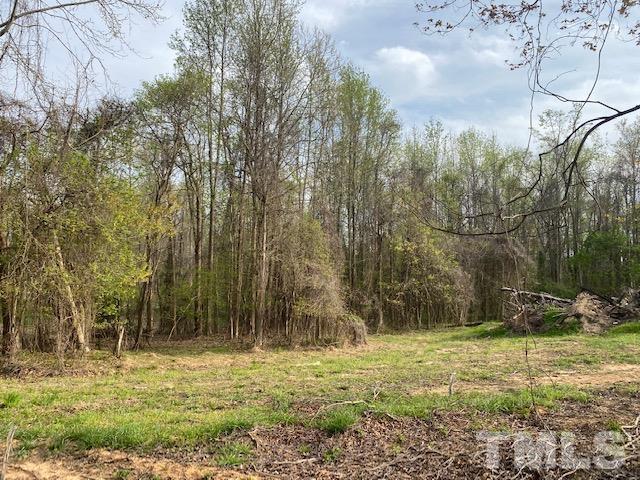 6 Lankford Street Roxboro, NC 27573 - Photo 1 of 8 a view of a yard