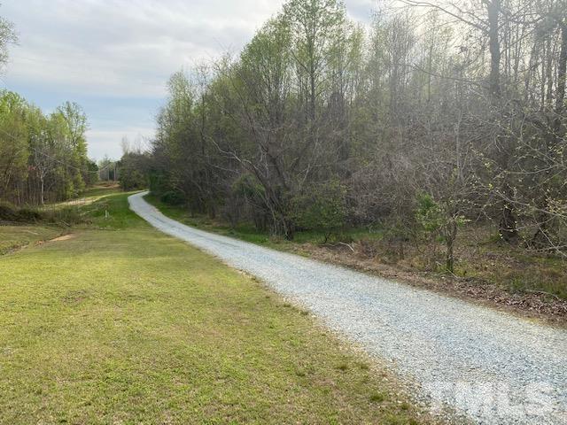 6 Lankford Street Roxboro, NC 27573 - Photo 6 of 8 a view of a yard with trees