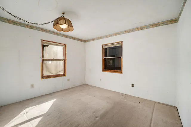 an empty room with window