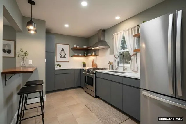 a bedroom with bed and a window