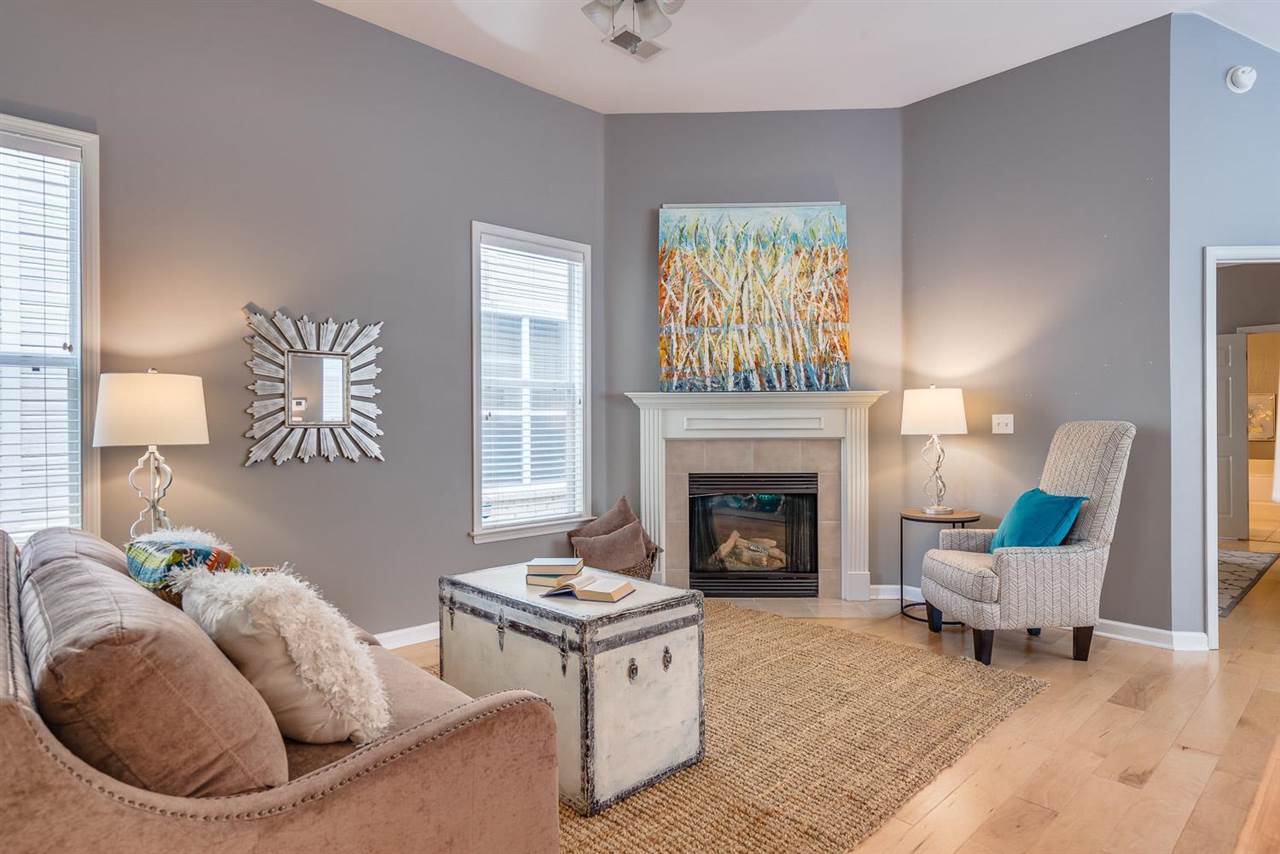 1448 Island Town Cove Memphis, TN 38103 - Photo 3 of 18 a living room with furniture and a fireplace