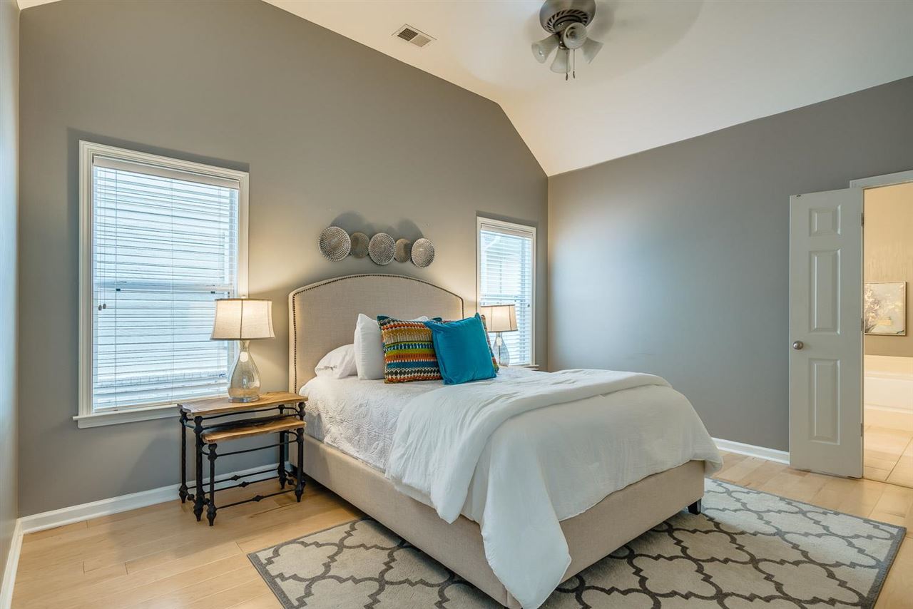 1448 Island Town Cove Memphis, TN 38103 - Photo 7 of 18 a bedroom with a bed and a window