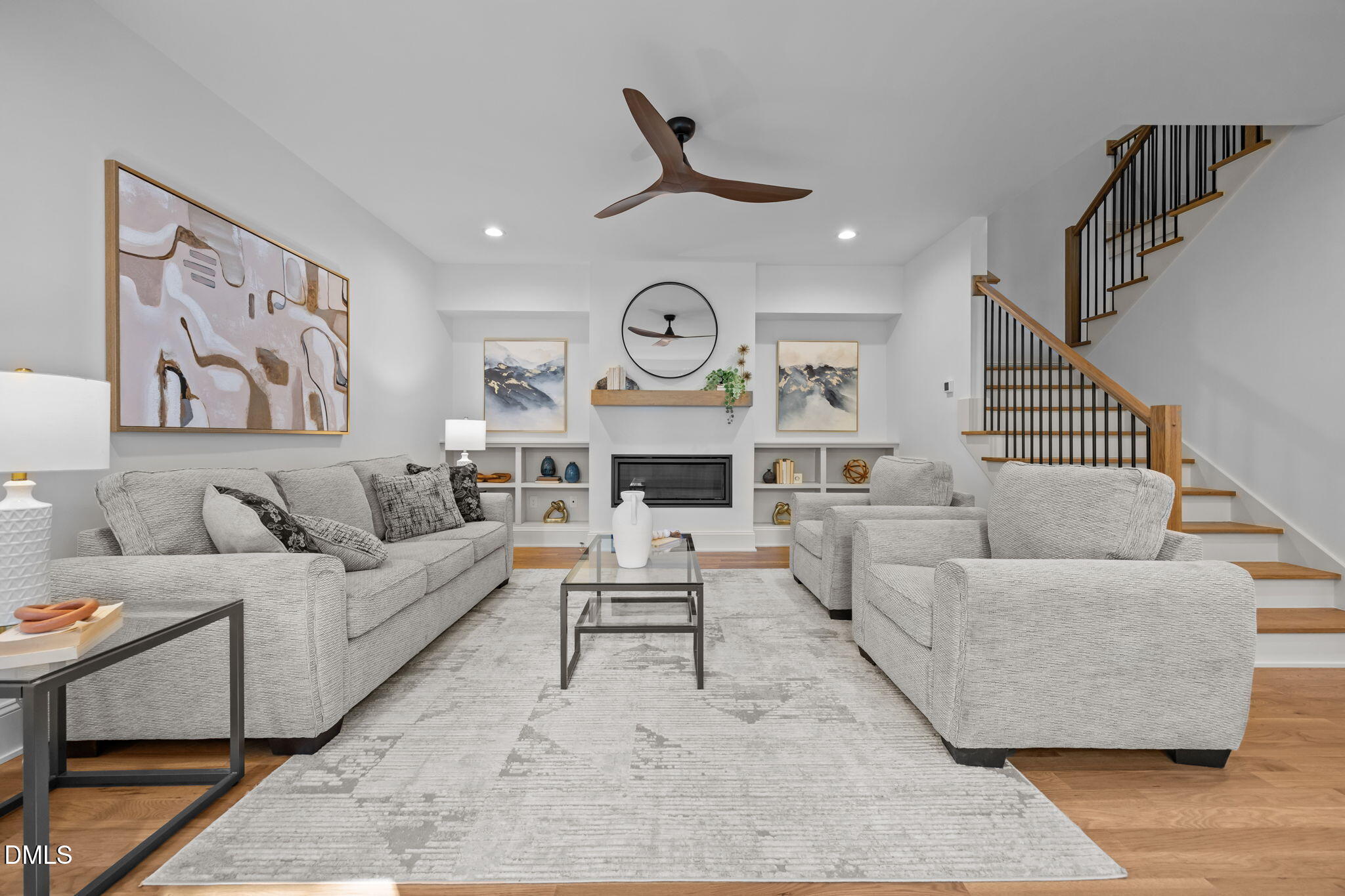 805 Tower Street, Unit 101 Raleigh, NC 27607 - Photo 1 of 38 a living room with furniture and a large window