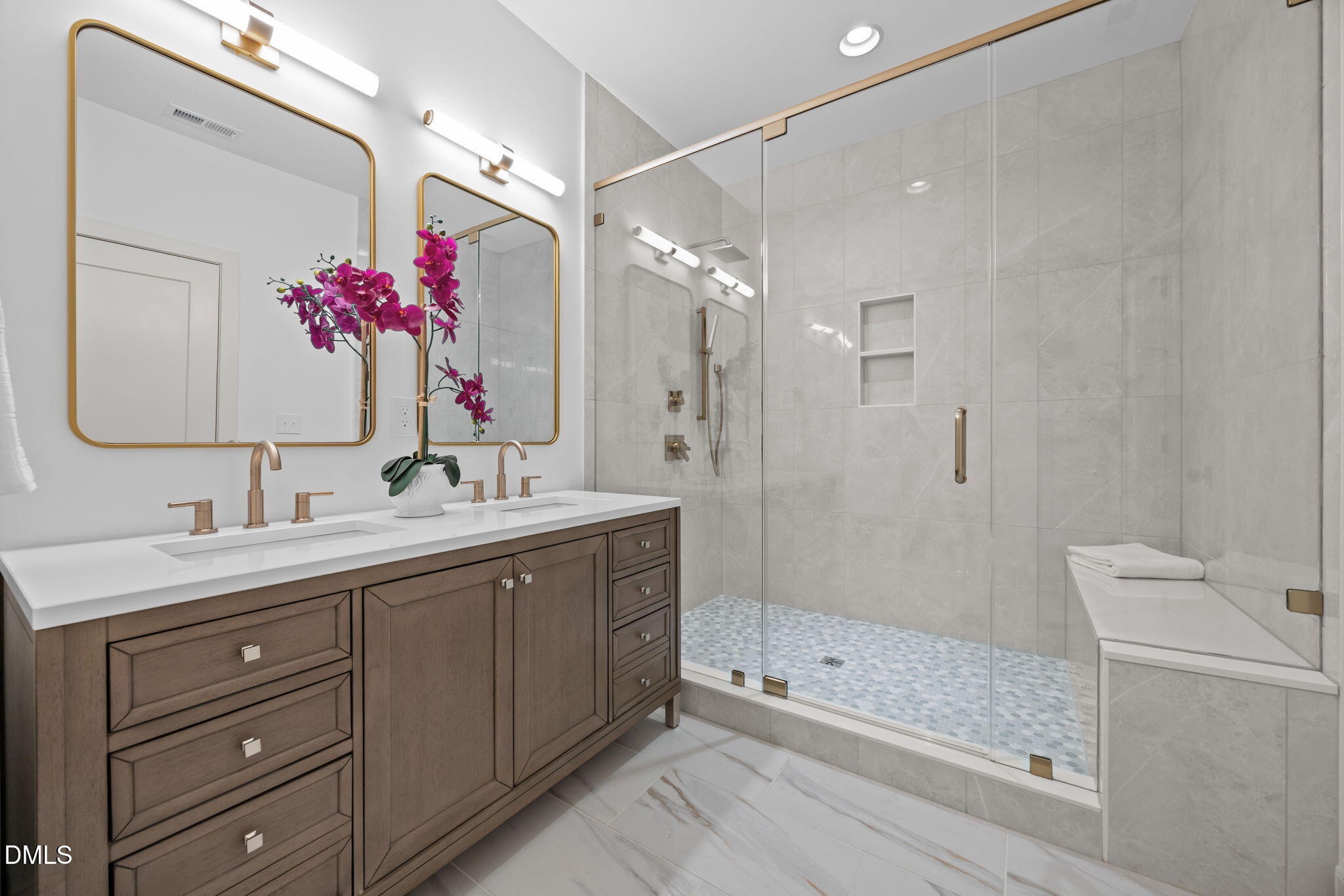805 Tower Street, Unit 101 Raleigh, NC 27607 - Photo 30 of 38 a bathroom with a shower sink vanity granite and mirror