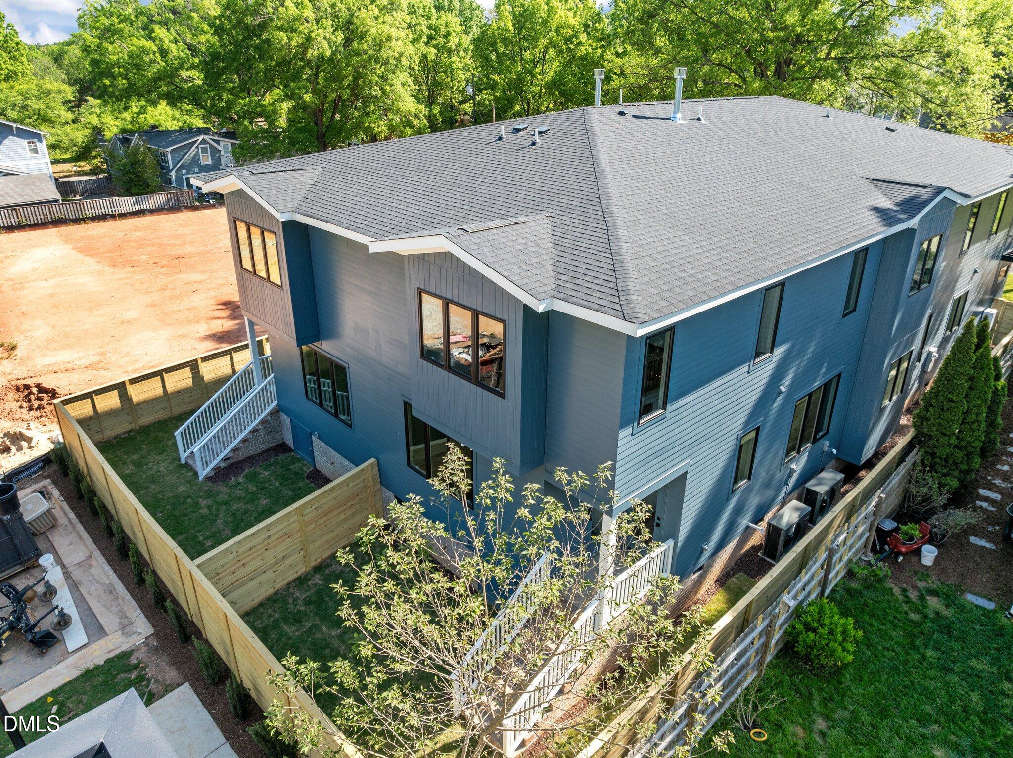 805 Tower Street, Unit 101 Raleigh, NC 27607 - Photo 34 of 38 an aerial view of a house with a yard