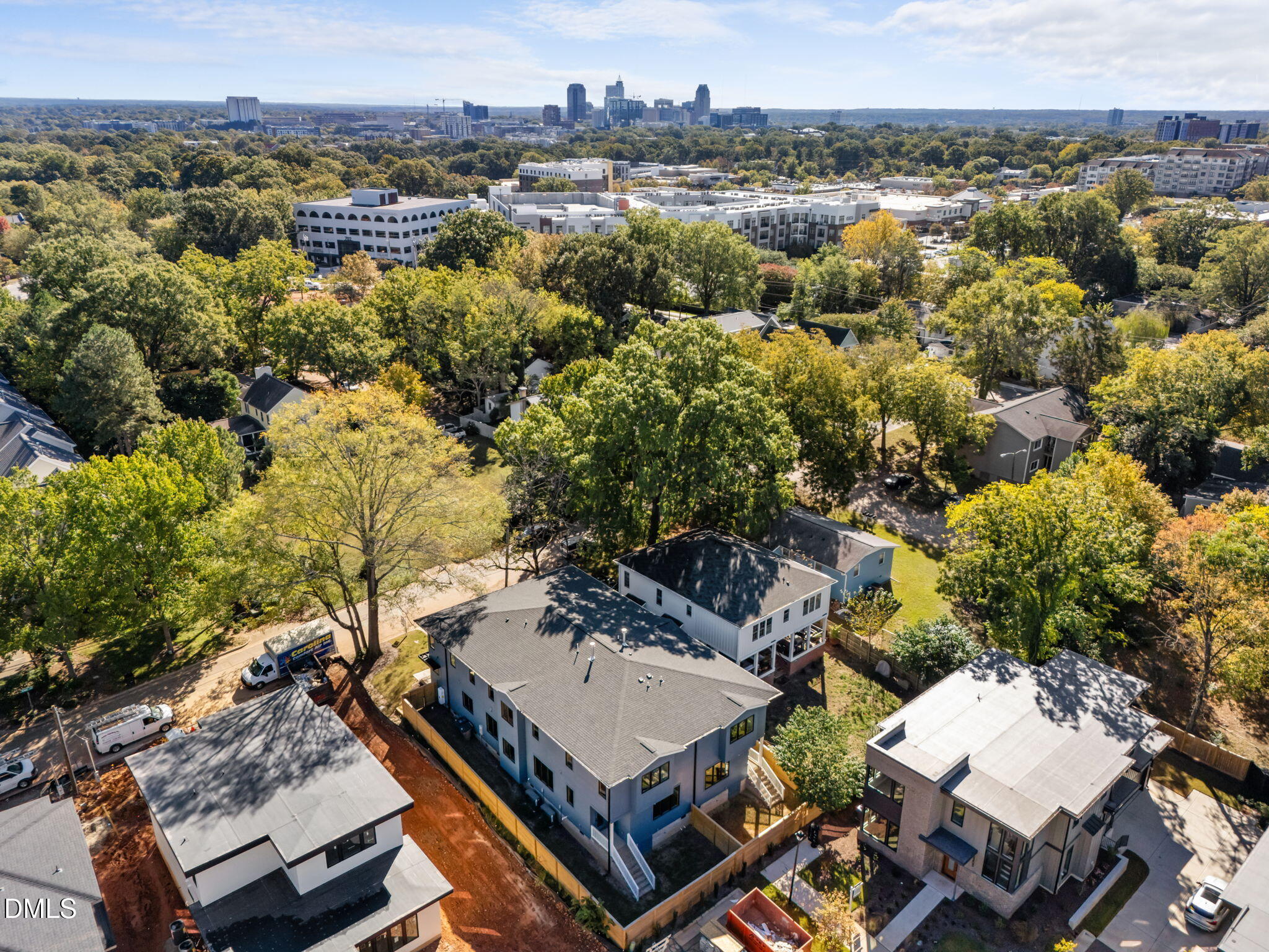 805 Tower Street, Unit 101 Raleigh, NC 27607 - Photo 36 of 38 an aerial view of a house with a yard