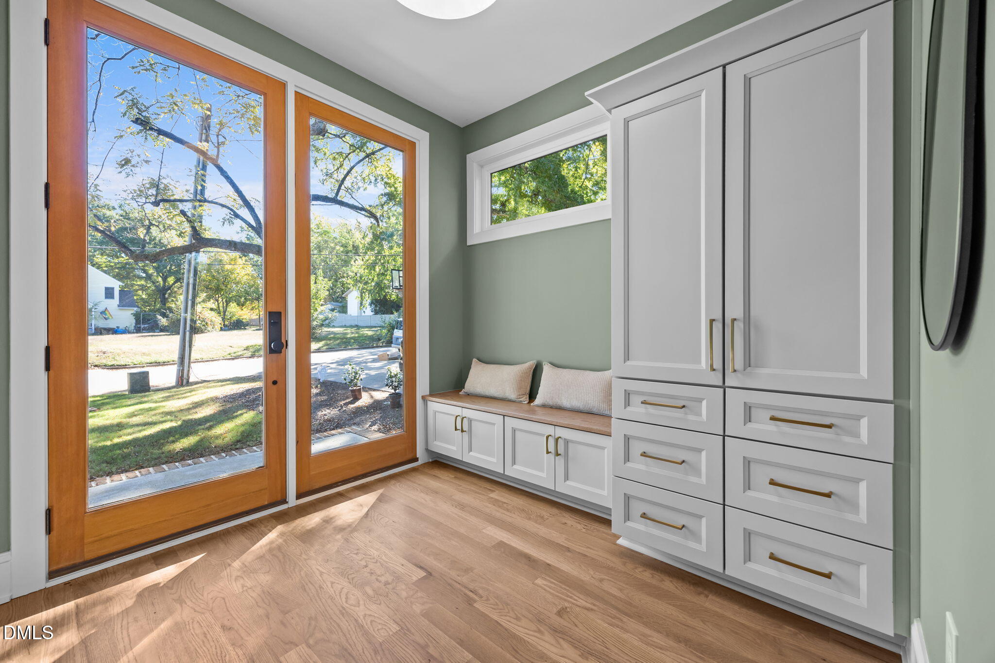 805 Tower Street, Unit 101 Raleigh, NC 27607 - Photo 9 of 38 a bed room with a bed and a window