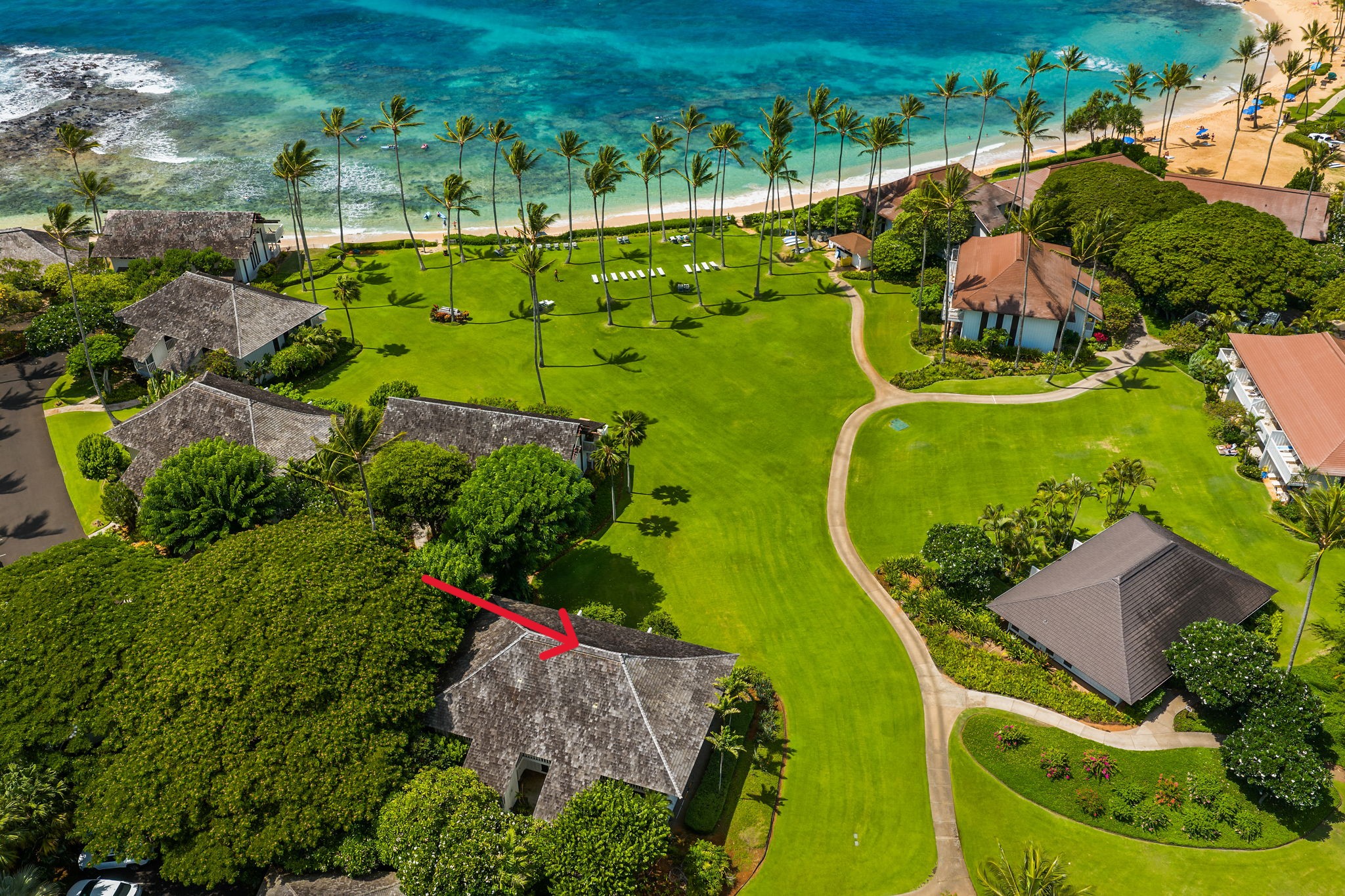 2253 Poipu Road, Unit 26 Koloa, HI 96756 - Photo 17 of 21 an aerial view of a pool yard swimming pool and outdoor seating