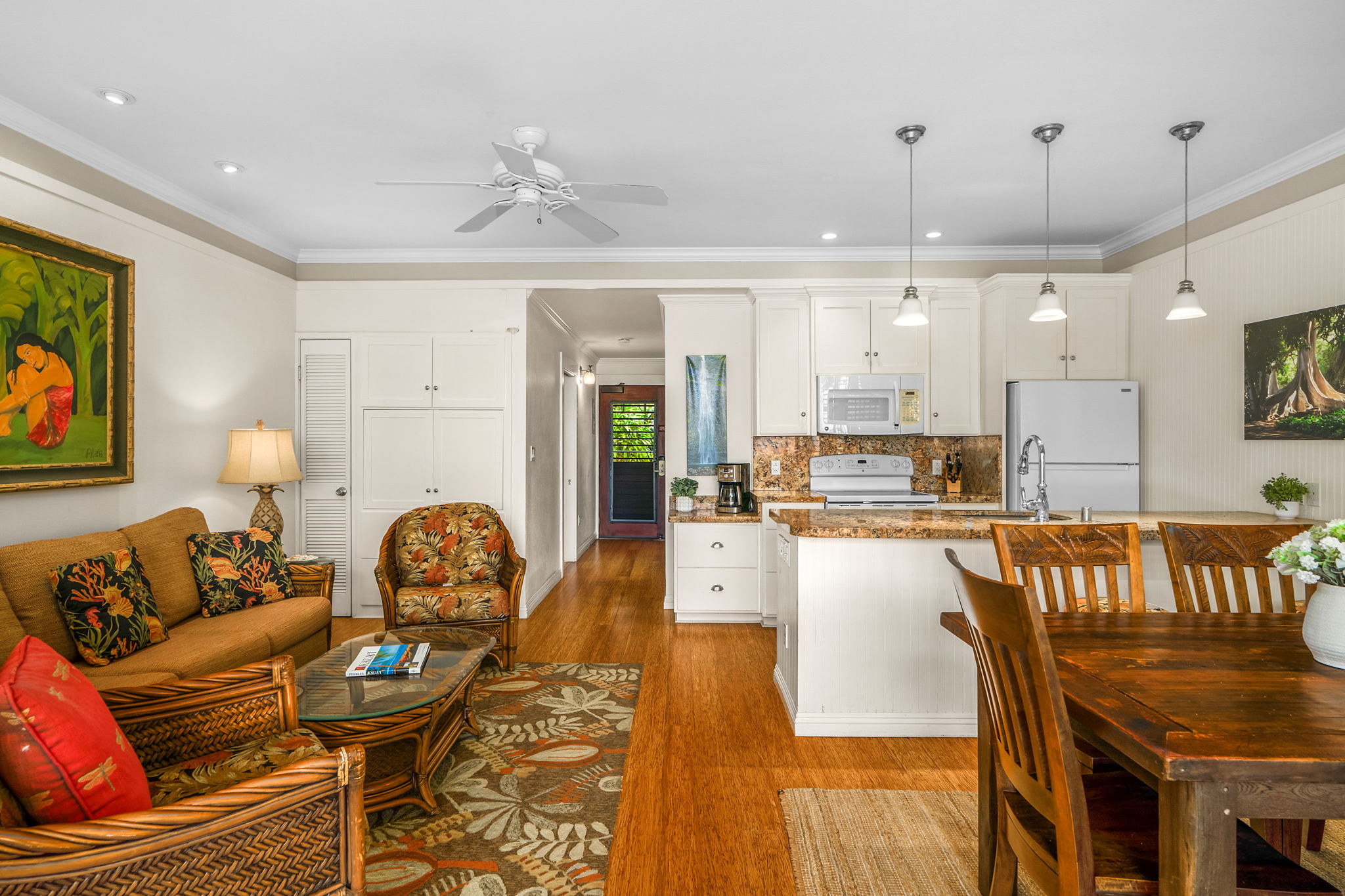2253 Poipu Road, Unit 26 Koloa, HI 96756 - Photo 4 of 21 a living room with furniture and kitchen view