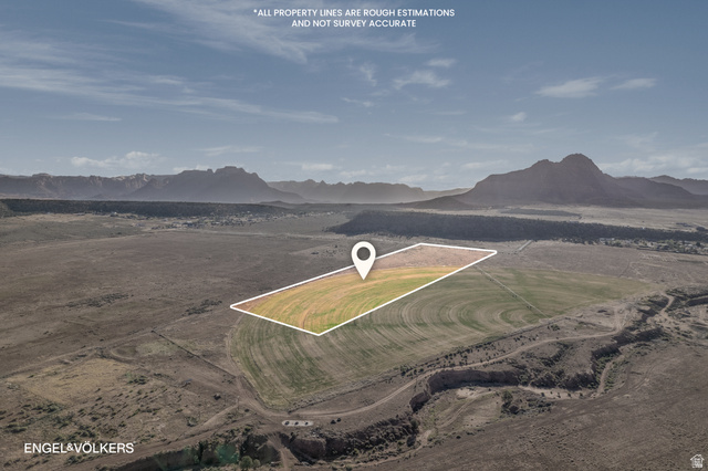 Gooseberry Way Apple Valley, UT 84737 - Photo 5 of 24 Expansive land parcel featuring a portion of cultivated fields and surrounding arid terrain