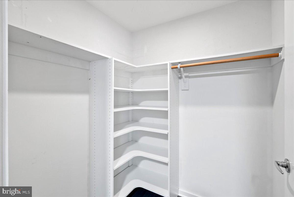3409 Wilson Boulevard, Unit 412 Arlington, VA 22201 - Photo 6 of 19 a view of an empty walk in closet