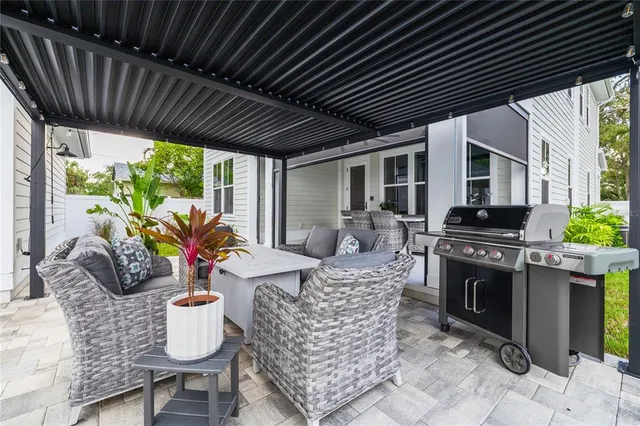 a outdoor living space with furniture and garden view