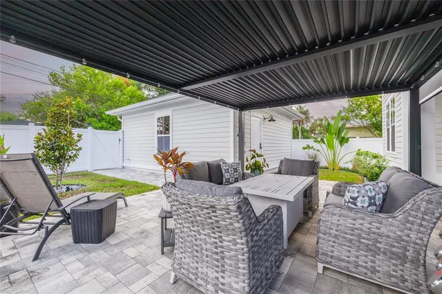 a outdoor living space with furniture and garden view