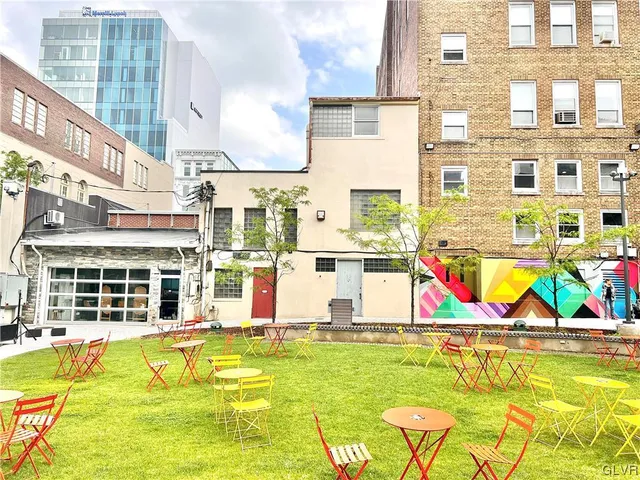 a view of a swimming pool with a lounge chairs