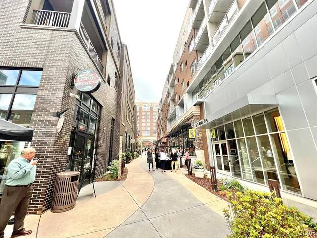 a view of an swimming pool with an outdoor seating