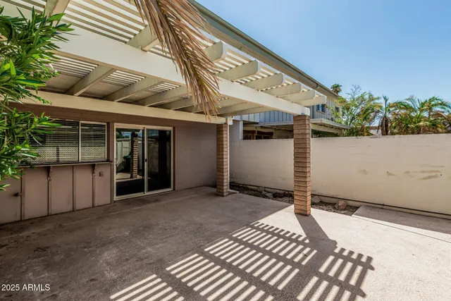 a view of backyard with seating space