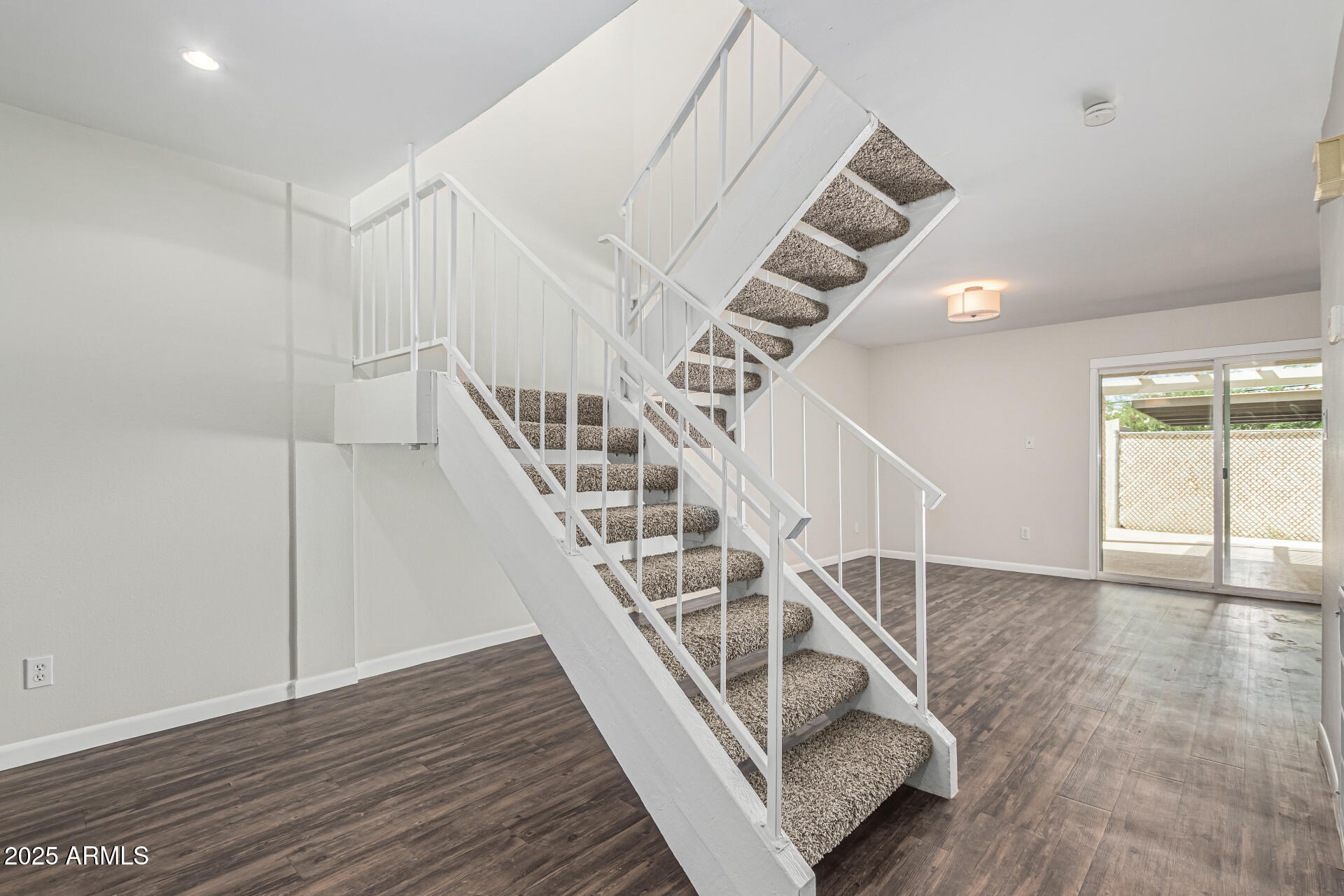 5815 East Thomas Road Scottsdale, AZ 85251 - Photo 4 of 19 a view of entryway and hall with wooden floor
