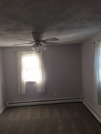159 South Acton Road Stow, MA 01775 - Photo 12 of 20 an empty room with a empty space and a window