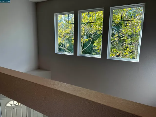 a toilet sitting next to a bath tub