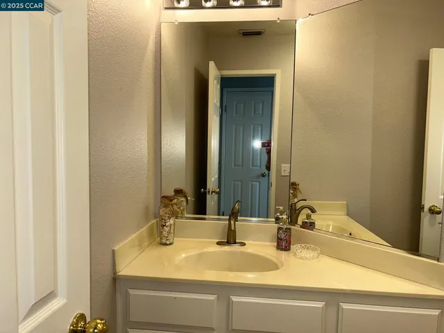 a bathroom with a toilet and a sink