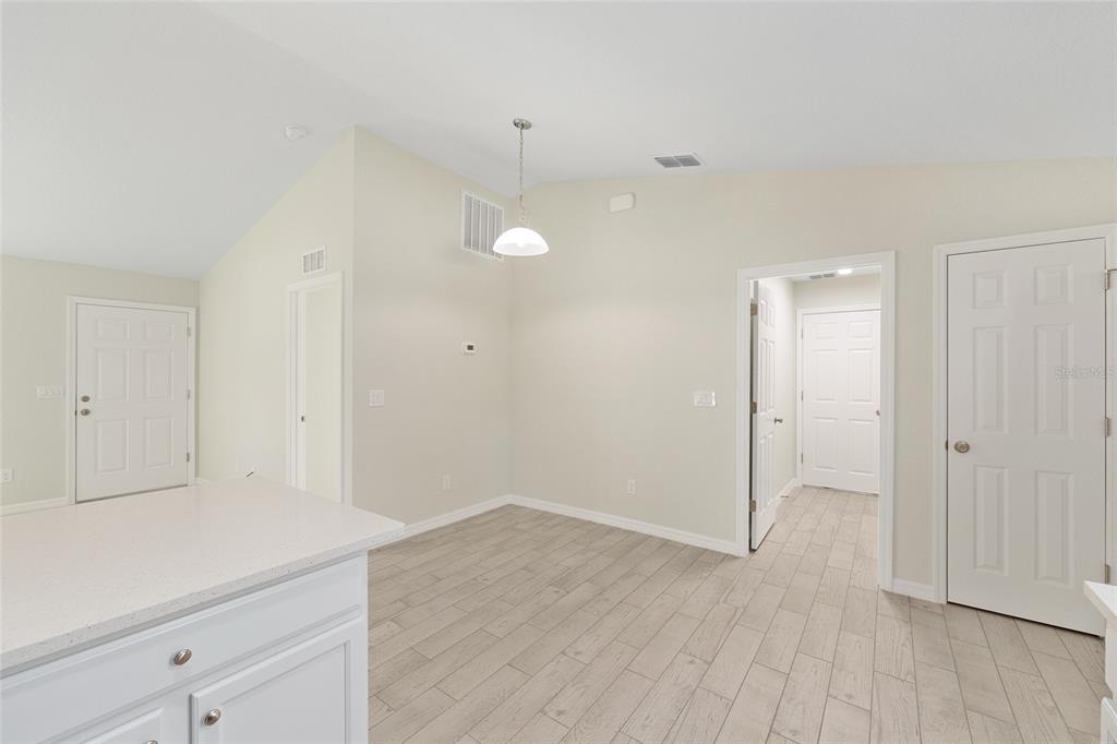 360 Locust Road Ocala, FL 34472 - Photo 22 of 48 a view of a room with wooden floor